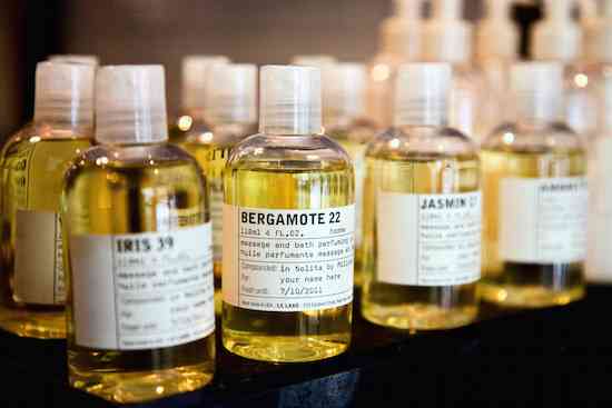 Small vials stand on Le Labo’s main counter in the New York City Nolita store on Friday, Aug. 20, 2010. The main ingredient of each fragrance determines the name displayed on the labels, while the apposed number refers to the total number of ingredients used for each concoction.